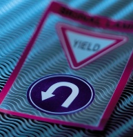 Yield and U-turn signs